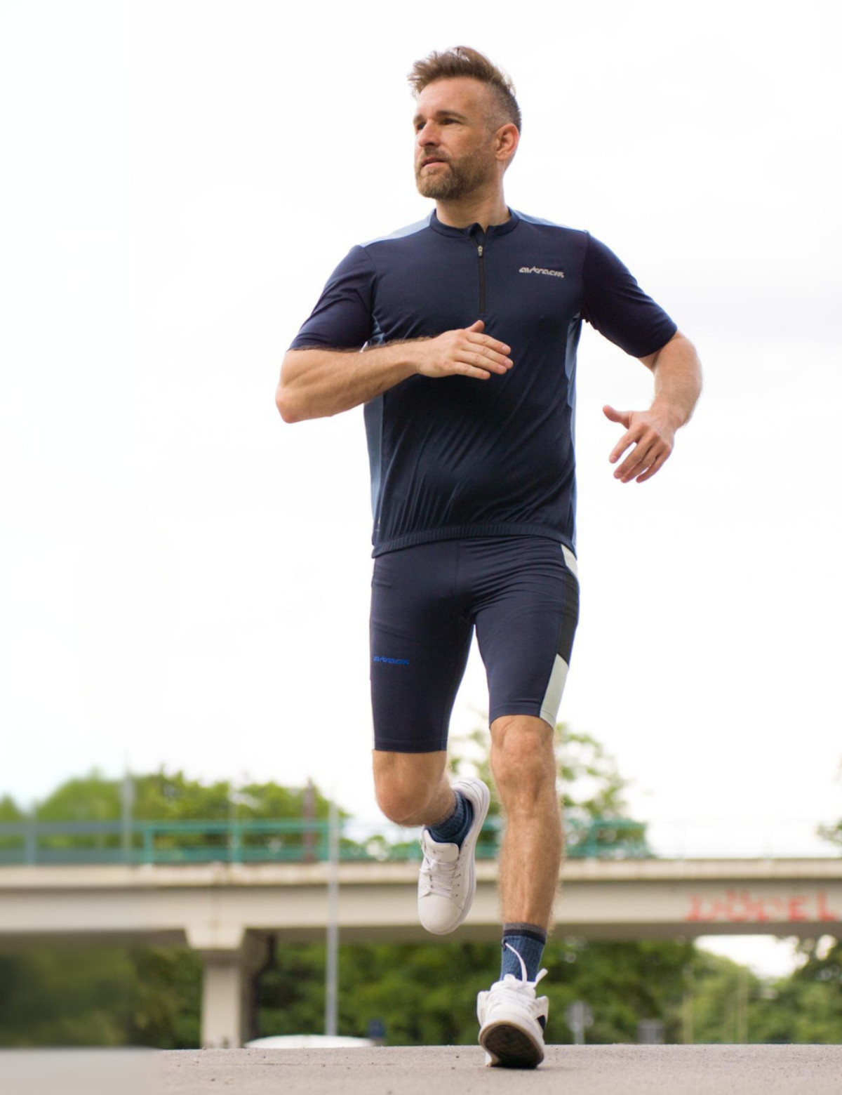 Pantalon de course masculin serré court par équipe bleu marine