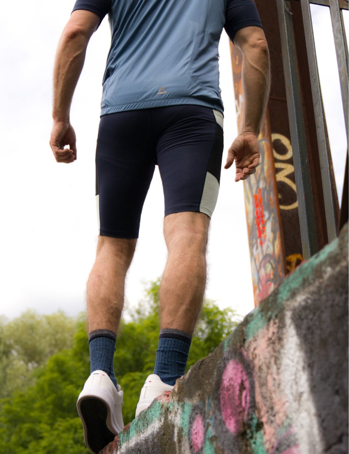 Pantalon de course masculin serré court par équipe bleu marine