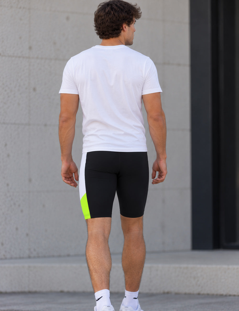 Pantalon de course masculin court néon noir